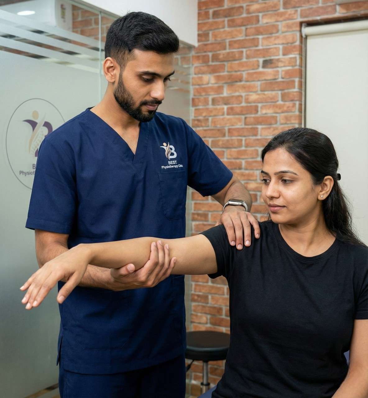 Dr. Sagar performing shoulder and arm joint assessment and passive range of motion in Bopal Ahmedabad
