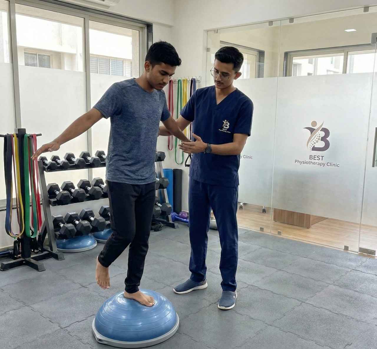 ACL patient performing balance and proprioception training on a BOSU ball to restore stability during sports rehabilitation