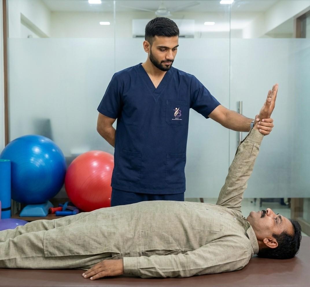 Physiotherapist Dr. Sagar helping a patient perform upper body and shoulder range of motion exercises for SCI.