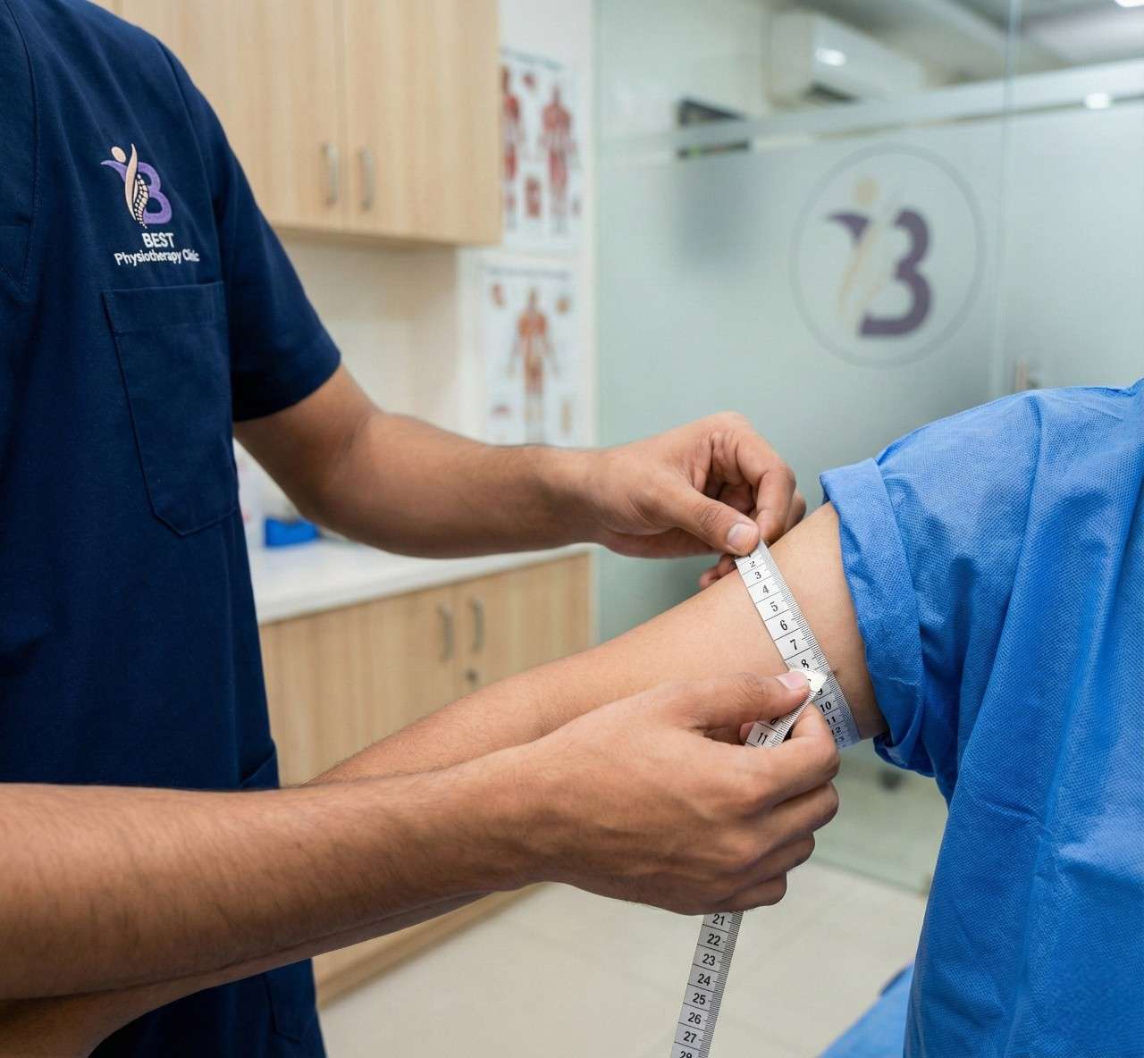 Physiotherapist measuring a patient's arm circumference as part of the fitness and weight management assessment.